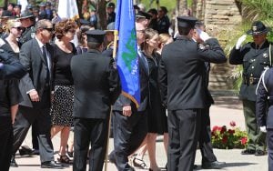 Members of the Glasser memorial are escorted by the Phoenix Police force. (Photo by Christina Tetreault/Cronkite News)
