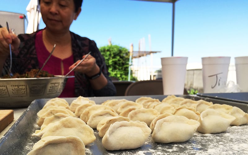 Dumplings have a long history in China. Chinese-Americans in the Phoenix area make dumplings together as friends and family. (Photo by Jiahui Jia/Cronkite News)
