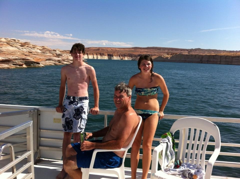 Tim, Rob and Kara Dunleavy dry off at Lake Powell. Kara Dunleavy enjoyed going with her dad and siblings to visit Chicago every Saturday for 15 years straight.