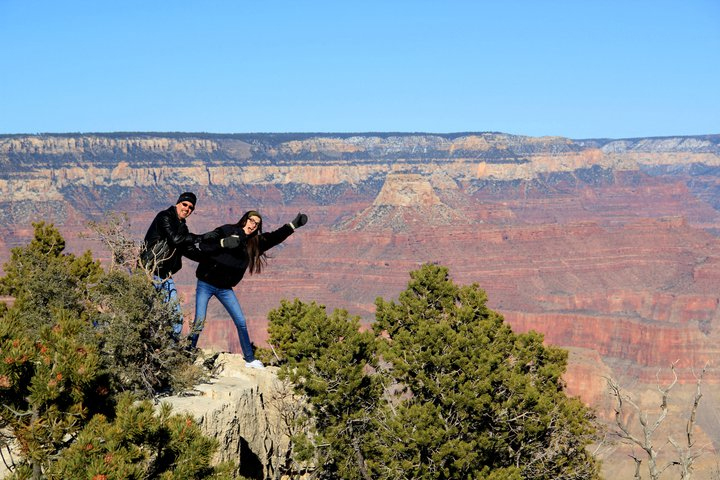 Peter and Kate Peifer poses precariously at the Grand Canyon. Kate Peifer says she and her father share a love of learning as far back as she can remember.
