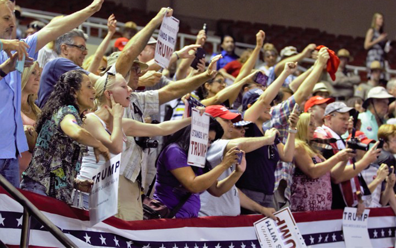 Trump supporters cheer for the candidate during a rally at Arizona Veterans Memorial Coliseum. (Photo by Selena Makrides/Cronkite News)