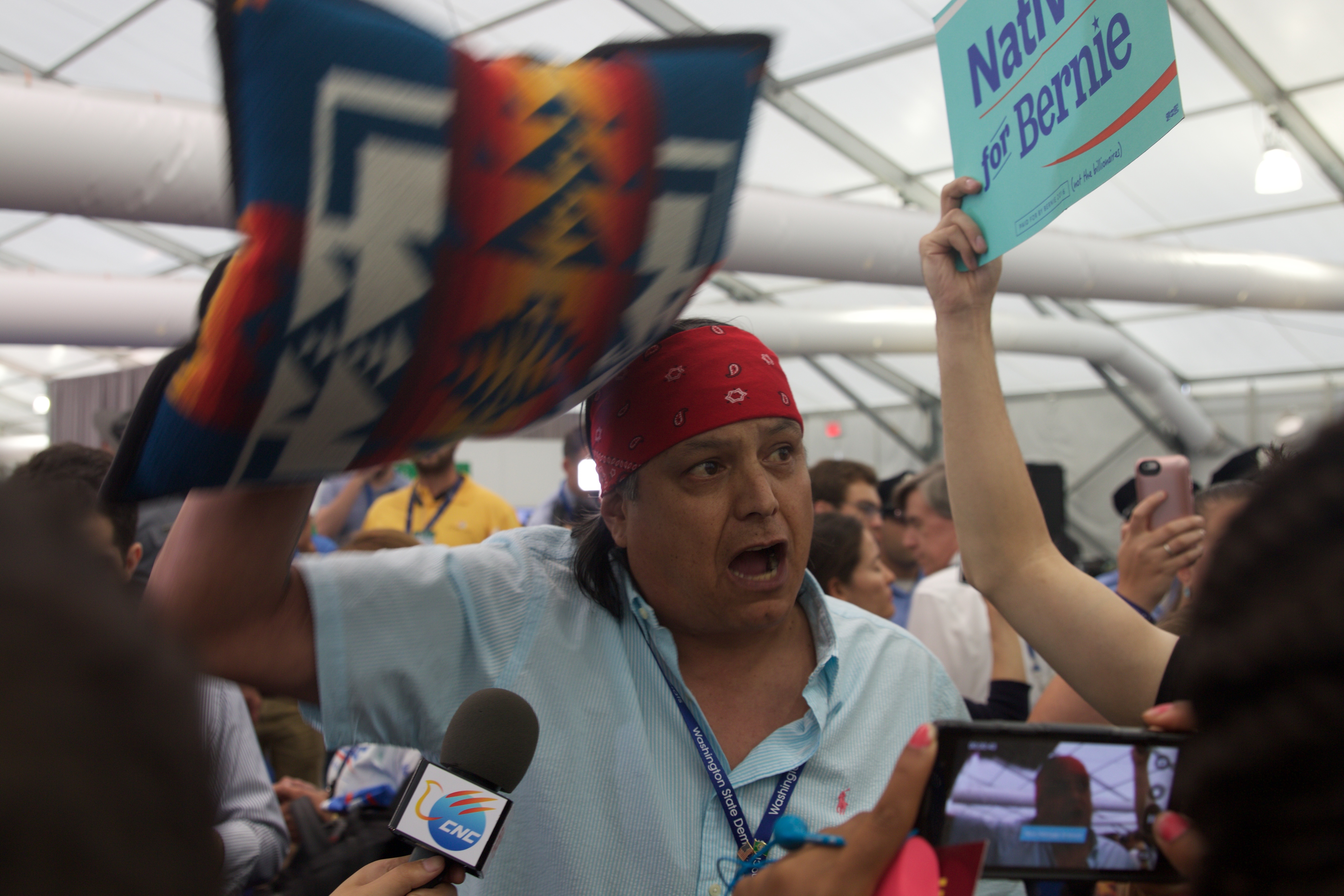 The staged walkout Tuesday night moved from the Democratic National Convention arena to the media tents. (Photo by Kelsey DeGideo/Cronkite News) 