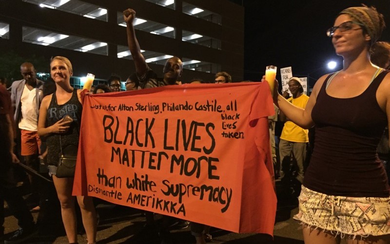 Demonstrators rally in Baton Rouge over black man's death