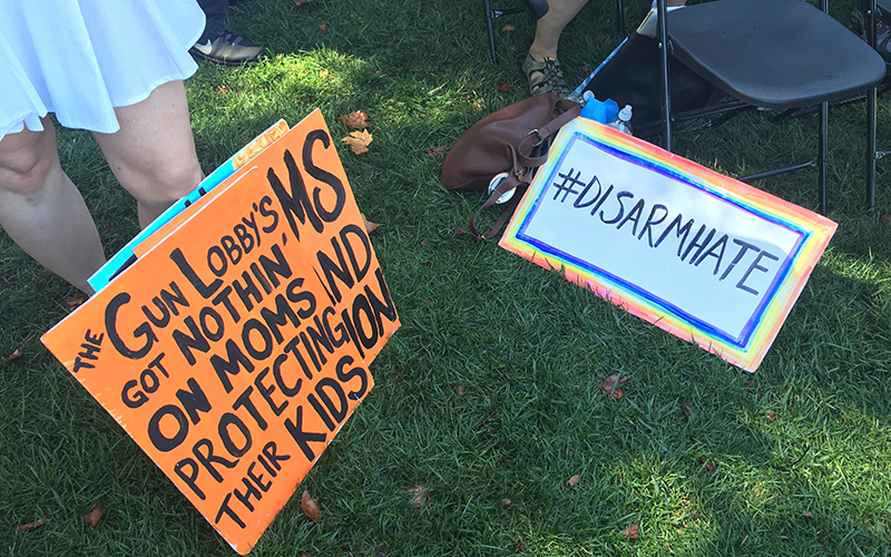 Signs made by attendants of the gun reform rally in Philadelphia. (Photo by Selena Makrides/Cronkite News)
