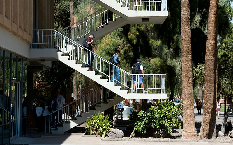 Arizona and 29 other states offer mail-in or excuse-free absentee ballots for college students. Shown here, students exit classrooms at Arizona State University's main campus in Tempe. (Photo by Roman Knertser/News21)
