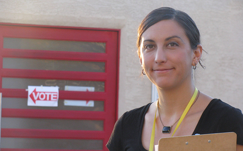 Sam Pstross, executive director of Arizona Advocacy Network, helped ensure election policies were followed at the Knights of Pythias polling location in Tempe on Tuesday. (Photo by Michelle Chance / Cronkite News)