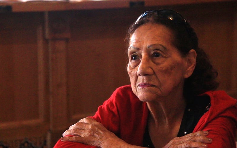 Dora Rogers, 88, applies for citizenship at a Mi Familia Vota citizenship fair at Los Altos Ranch Market in Phoenix on Sat., Aug. 27. (Photo by Brian Fore/Cronkite News)