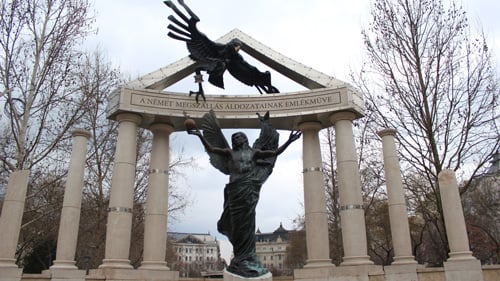 A view of statue of the German imperial Eagle attacking an angel which is meant to represent the Hungarian victims of the Nazis at Freedom Square in Budapest on March 6, 2016. (Photo by Kelcie Grega/Cronkite Borderlands Project)