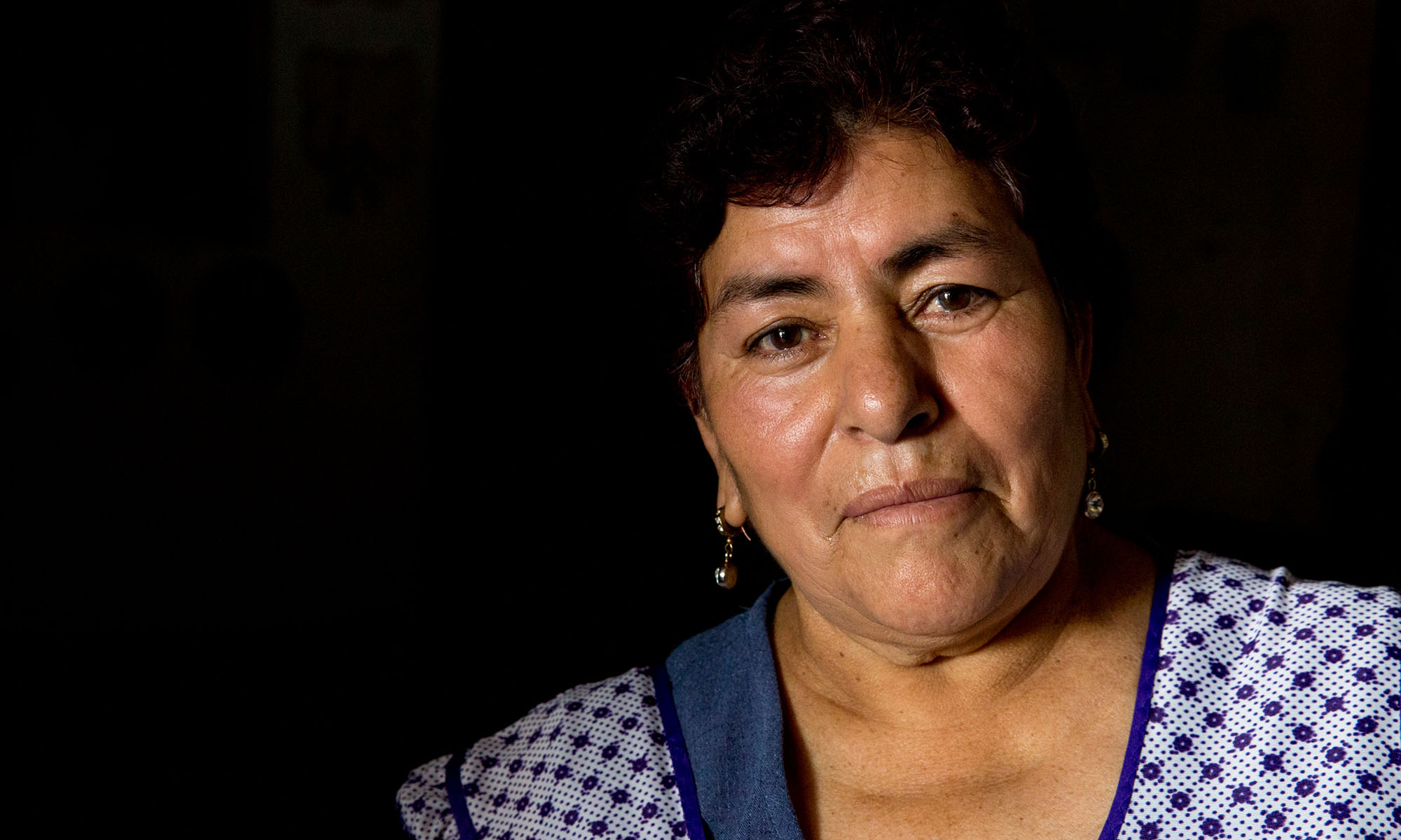 Efigenia Rodriguez Cecilia is a mother of five with one son in the United States who sends remittances to her every two weeks, when he is paid. He has two U.S.-born daughters whom Rodriguez has only seen online over video calls. During Donald Trump’s campaign for president he said that Mexico would pay for a “big, beautiful wall” that would separate Mexico and the United States, even if that meant taxing remittances to Mexican families from the U.S. (Photo by Courtney Pedroza/Cronkite Borderlands Initiative)