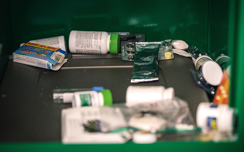 Phoenix police have installed prescription drop-off bins at precincts so people can get rid of unwanted drugs. Officer Joe Bruno and his colleagues must empty the bins once every month. However, he said they empty them about once every week because they fill up too fast. This bin at the Mountain View precinct had just been emptied. (Photo by Ryan Dent/Cronkite News)