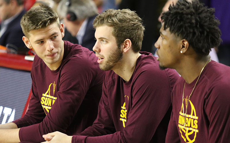 Arizona State's Vitaliy Shibel, left, Mickey Mitchell, center, and Romello White, right, interact before a game. ASU defeated Washington, 86-75, Wednesday at Wells Fargo Arena in Tempe.(Photo by Fabian Ardaya/Cronkite News)