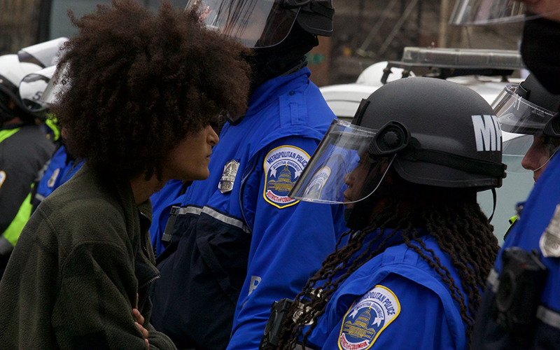 Tensions begin to boil as protesters and the Metropolitan Police Department face off for the first time. (Photo by Dustin Quiroz/Cronkite News)