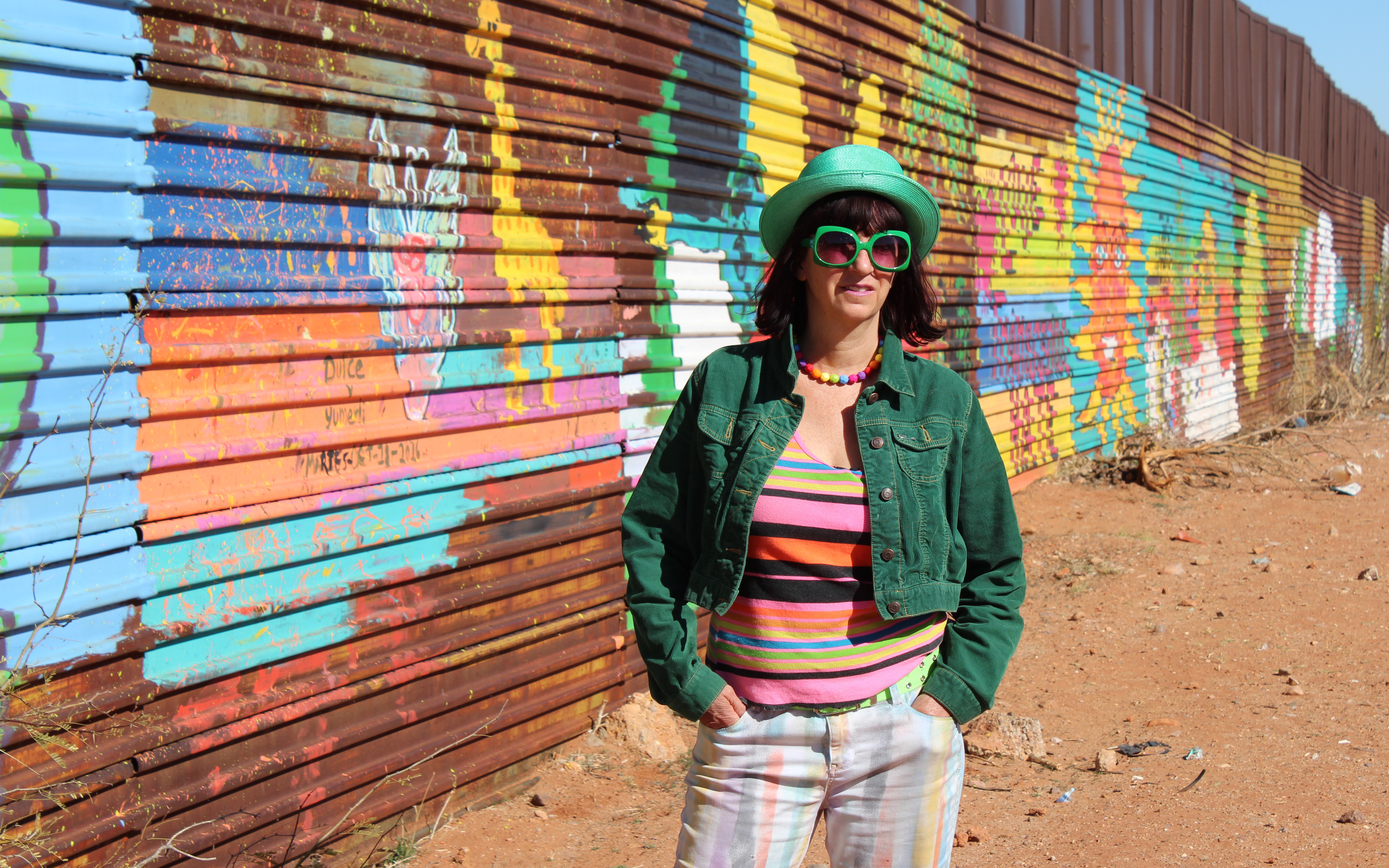 Gretchen Baer, a Bisbee, Arizona artist created The Border Bedazzlers, which used the border fence into a canvas for art by children. (Photo by Charlene Santiago/Cronkite News)