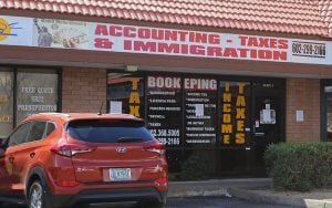 A business advertising taxes and immigration services in Phoenix, Arizona. (Photo by Sarah Jarvis/Cronkite News)