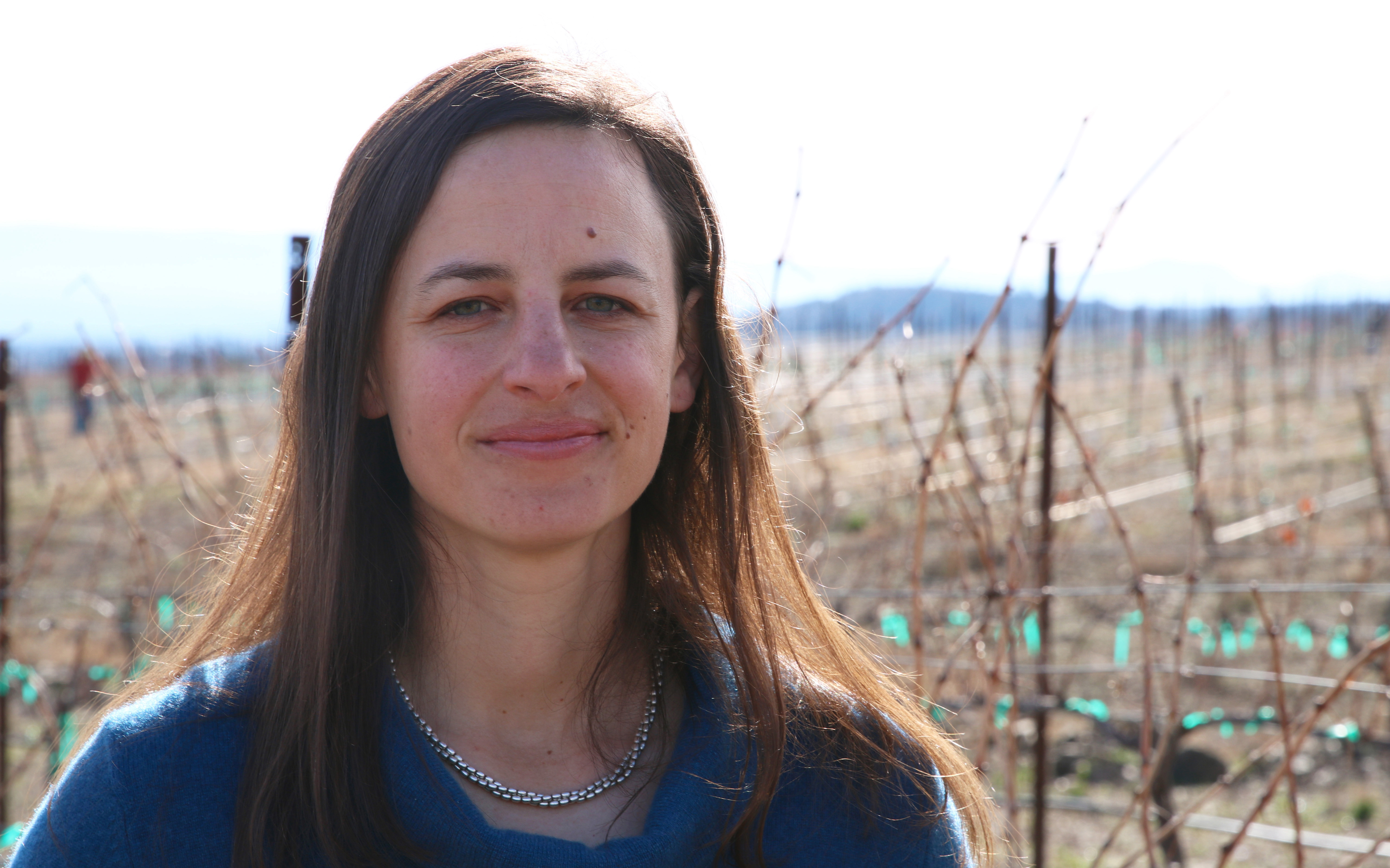 Nikki Bagley,  viticulture director at Southwest Wine Center and an Instructor at Yavapai College, explains the process of using reclaimed water to irrigate  the center's  vineyard in Cottonwood. (Photo by Jessica Clark/ Cronkite News).