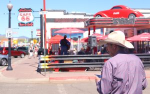 In Williams, cowboy hats and Route 66 make for an intersting marriage, but tourists love it. (Photo by Charlie Clark/Cronkite News)