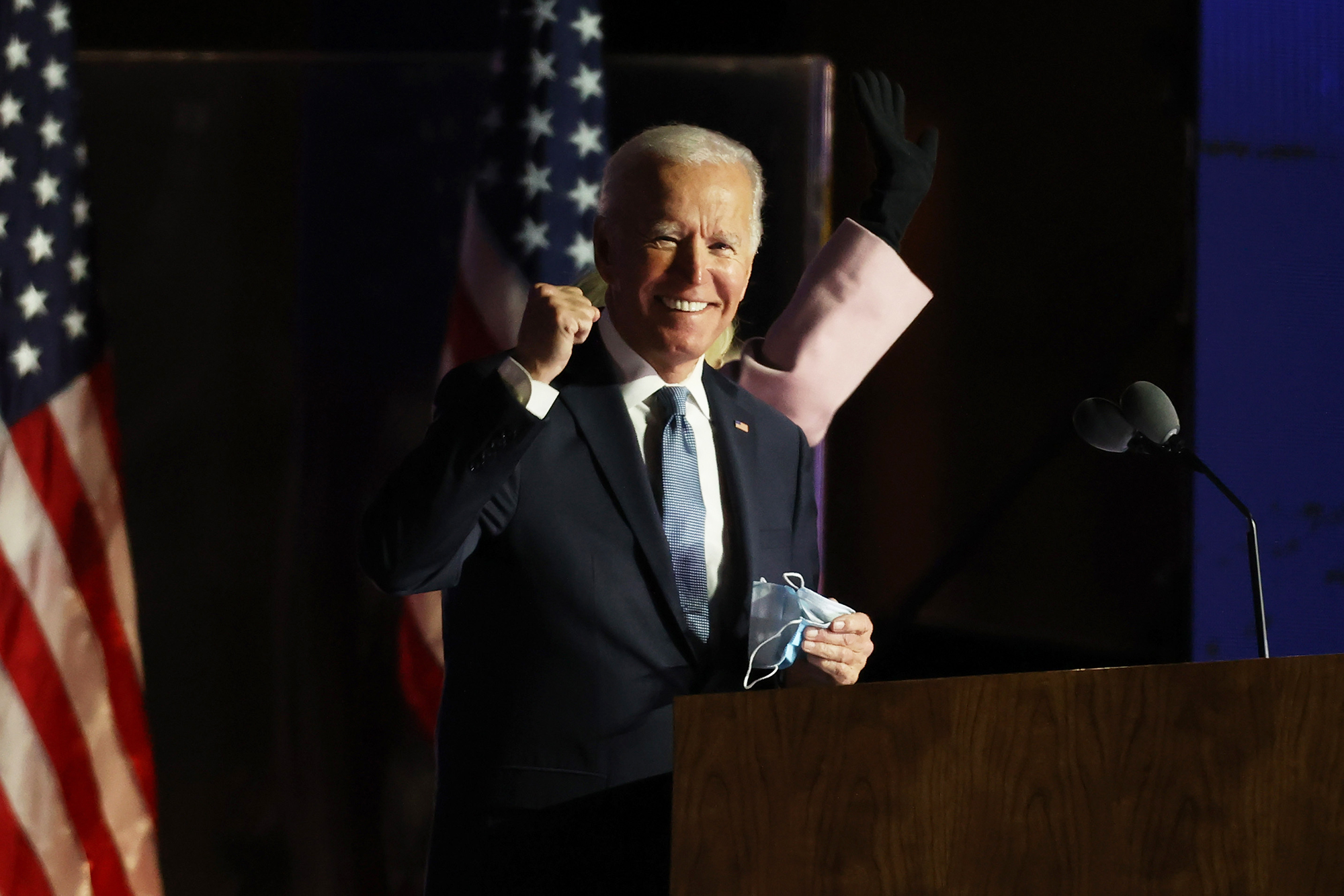 Democratic presidential nominee Joe Biden speaks at a drive-in election night event at the Chase Center in the early morning hours of Nov. 4, 2020 in Wilmington, Delaware. Biden put out a statement Saturday morning, saying he is “honored and humbled” by the trust Americans have placed with them. (Photo by Tasos Katopodis/Getty Images)
