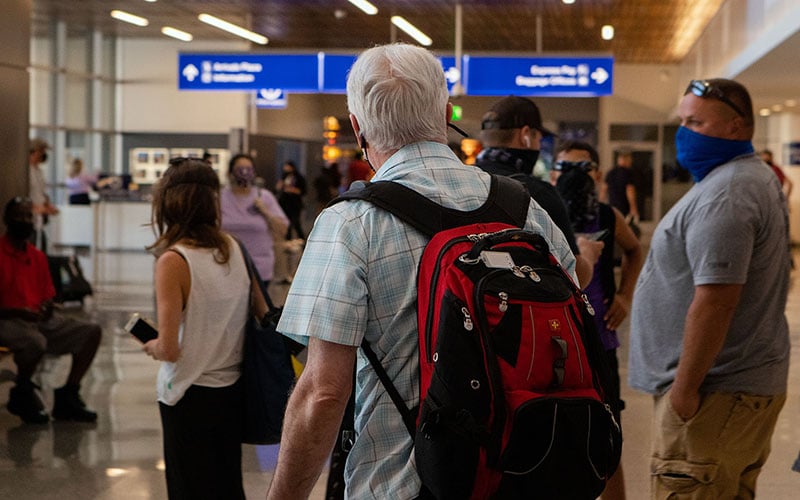 Holiday travel down this year, but millions still hit roads, airports ...