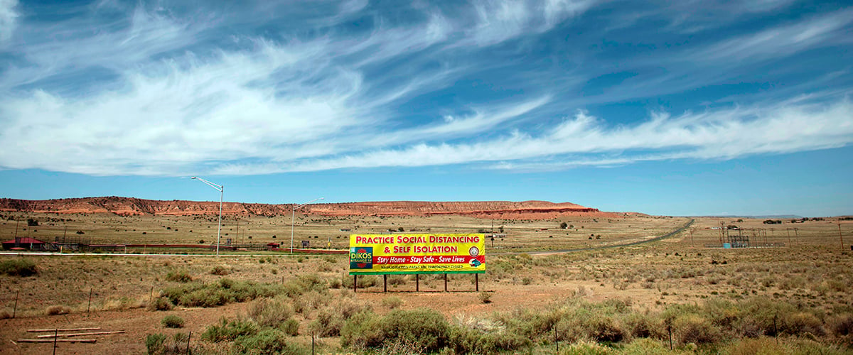 Although the Navajo Nation has rebounded after COVID-19 hit the community hard, and rez ball returned, reminders of the pandemic remain. (Photo by Mark Ralston/AFP via Getty Images)
