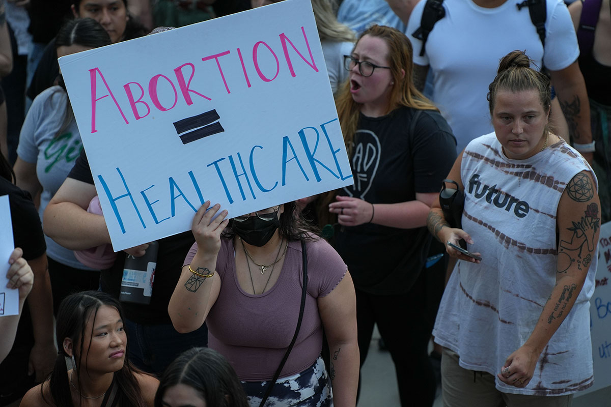 Activists and organizations on both sides of the abortion debate are figuring out how best to help pregnant people after the U.S. Supreme Court overturned Roe v. Wade. Protesters converged on the Arizona Capitol on June 24, 2022, as abortion procedures ceased in the state. (Photo by Troy Hill/Cronkite News)
