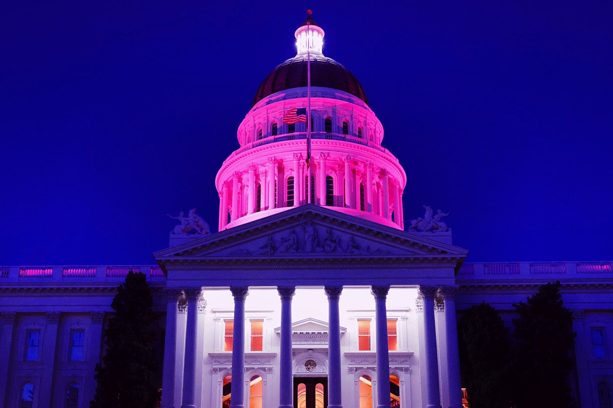 The dome of California’s Capitol was lit in pink after the U.S. Supreme Court overturned the landmark decision that had legalized abortion across America. California is one of several states positioning itself as a “safe haven” for those seeking legal abortion services. (Photo courtesy of Office of the Governor of California)
