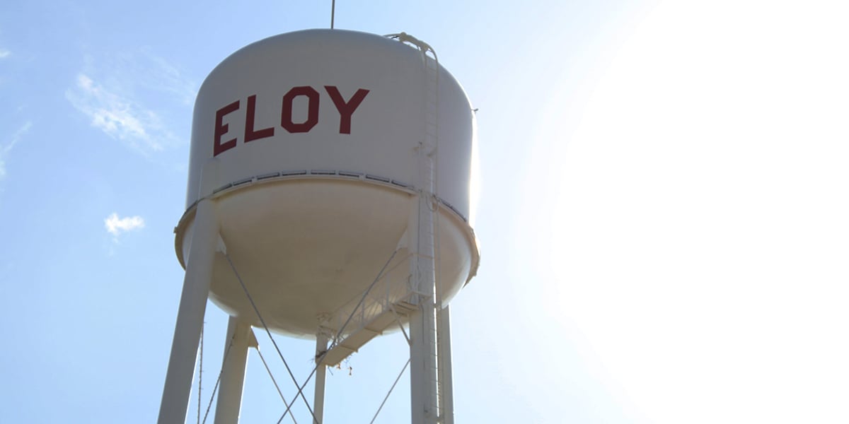 The water tank stands tall over Eloy, which over the decades evolved from Cotton City to Football City. (Photo by Andrew Lwowski/Cronkite News)
