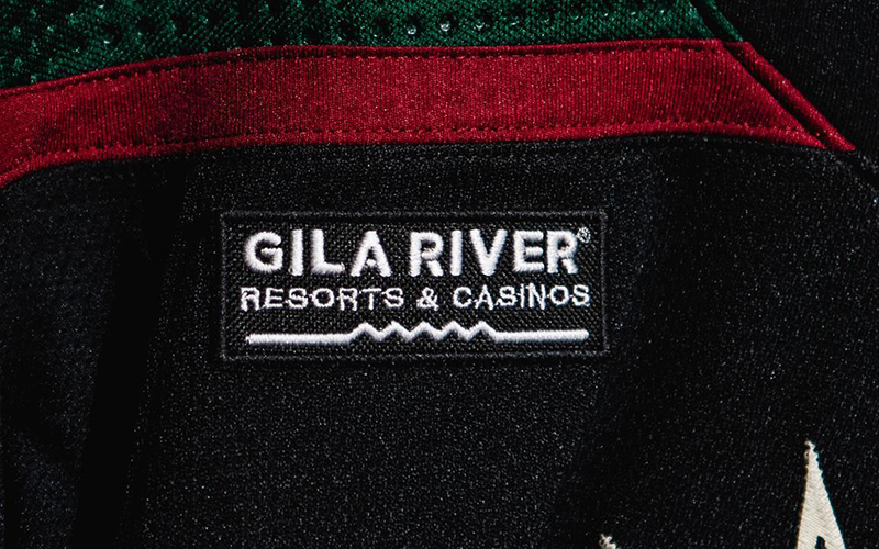 As part of a new multi-year partnership, the Arizona Coyotes will wear a Gila River Resorts & Casinos patch on the black Kachina home jerseys starting in the 2022-23 NHL season. (Photo courtesy of Kelsey Grant/Arizona Coyotes)