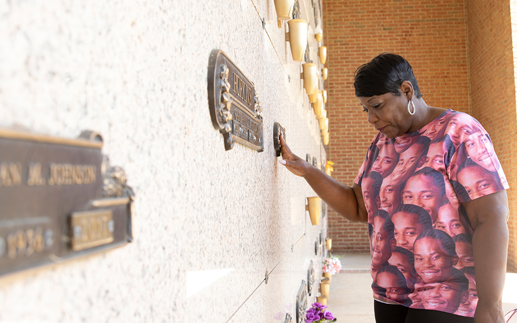 Marion Gray-Hopkins visits the resting place of her son, Gary Hopkins Jr,. at the Fort Lincoln Funeral Home & Cemetery in Brentwood, Maryland. The 19-year-old was shot and killed by a police officer in 1999. (Photo by Diannie Chavez/News21)