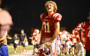 Freshman safety and kicker James Pike cheers on a touchdown against St. Mary’s. Brophy College Prep’s freshman football team is 6-1 this season. (Photo by Mary Grace Grabill/Cronkite News)