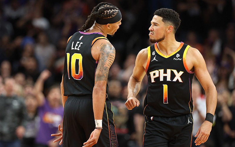 The Phoenix Suns overcame a 22-point deficit in Wednesday's season opener against the Dallas Mavericks behind key contributions from guards Devin Booker, right, and Damion Lee. (Photo by Christian Petersen/Getty Images)