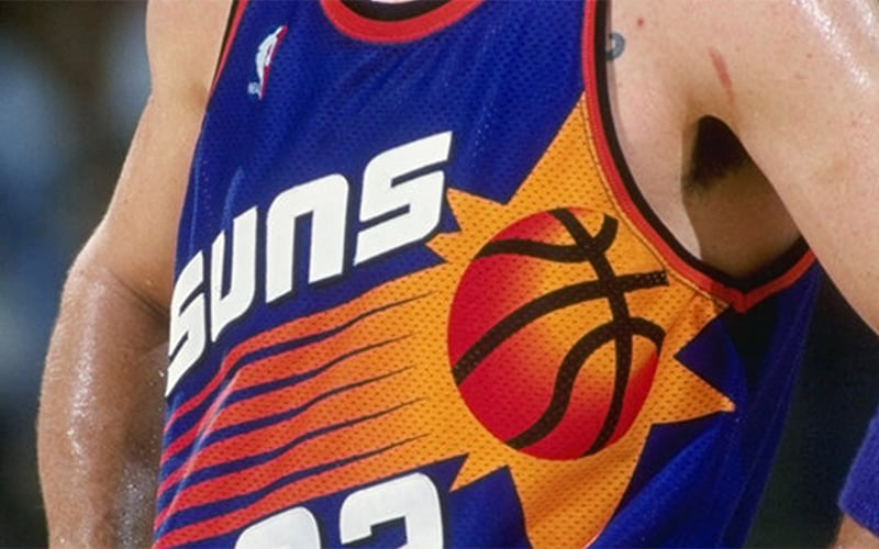 Jerry Colangelo wanted a logo to reflect the Phoenix Suns as a franchise that was trending upward, not setting. So the new logo became a rising sun. (Photo courtesy of Tom O’Grady)