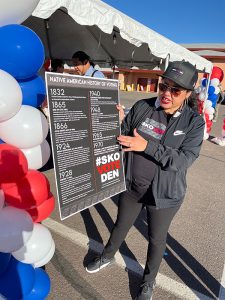 Angela Willeford explains the history of voting rights at a polling location on the Salt River Pima-Maricopa Indian Community on Tuesday. (Photo by Emma Petersen/Special for Cronkite News)