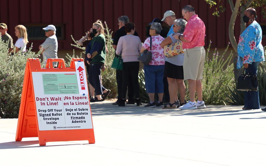 Voters wait in line at the Litchfield Elementary School District Support Services building to cast their ballots in Litchfield Park on Nov. 8, 2022. (Photo by Alexia Faith/Cronkite News)