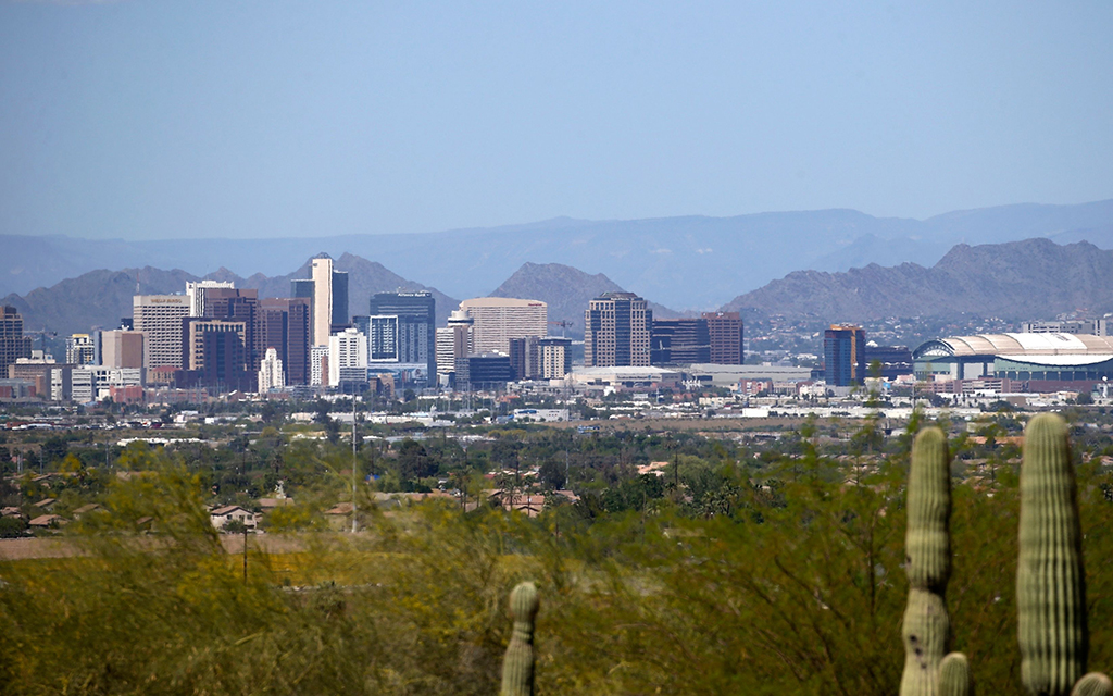 Arizona will have added more than 100,000 jobs by the end of the year, with 86,000 of them in metro Phoenix. (Photo by Ross D Franklin/AP/Shutterstock)
