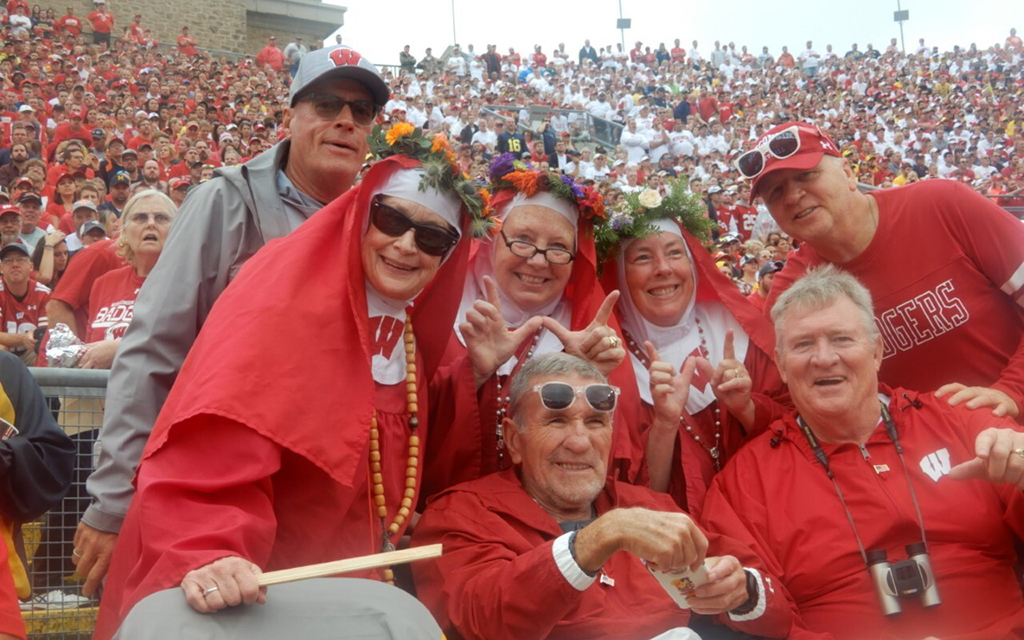 The group gathered at a Wisconsin football game in 2019. “These guys have been doing this for 30 years and now we are getting younger guys who will hopefully carry the torch to keep it going,” Ralph DeMarco said. (Photo courtesy of Jim Lavan)
