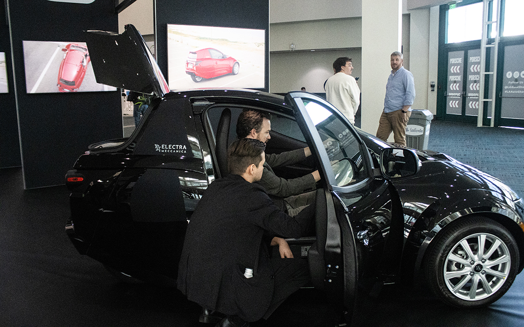 The ElectraMeccanica Solo is a single-seat electric vehicle imported from China and priced at $18,500. It was displayed Nov. 17 at the Los Angeles Auto Show. (Photo by Emeril Gordon/Cronkite News)