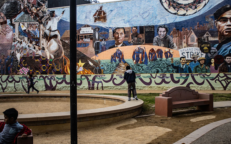 Kids play in Unidad Park in Los Angeles' Historic Filipinotown, which features a mural portraying Filipino-American heroes, including labor leaders. (Photo by Emeril Gordon/Cronkite News)