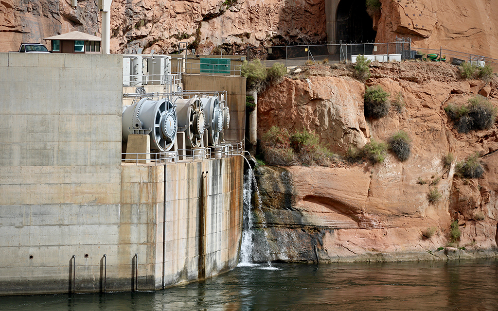 A set of four tubes known as the "river outlet works" could soon be the only way for water to make it through Glen Canyon Dam. Without changes to those tubes, Lake Powell could have dropped low enough to cut off Page’s drinking water supply completely. (Photo by Alex Hager/KUNC)