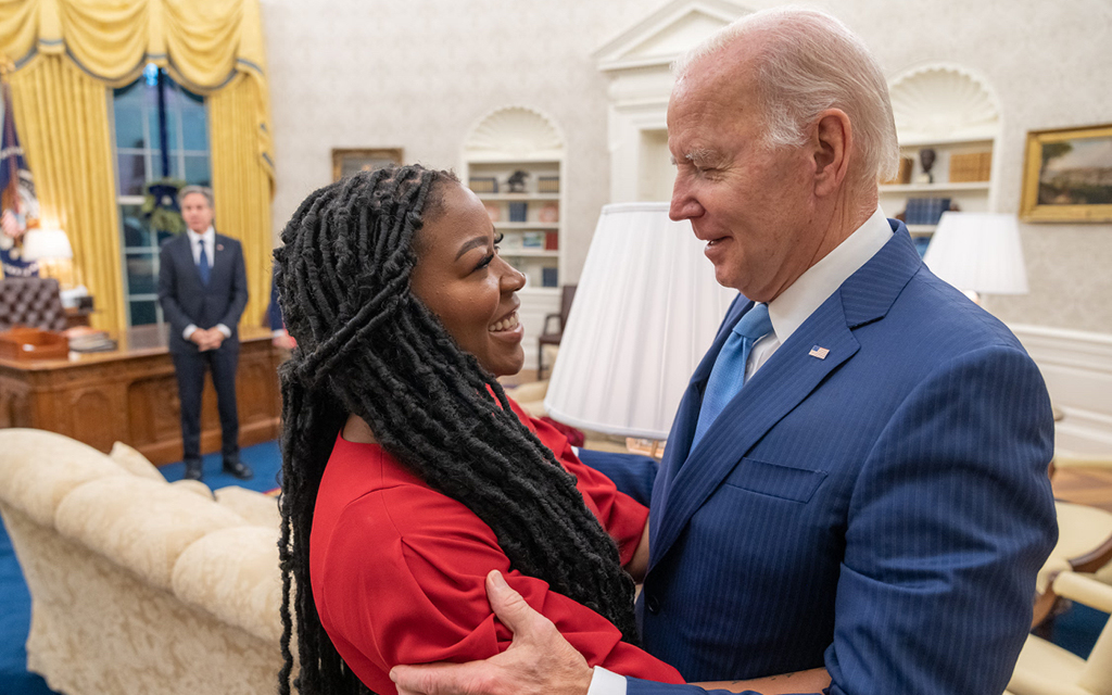 Cherelle Griner, the wife of Phoenix Mercury center Brittney Griner, smiles as she talks to President Joe Biden following the WNBA standout’s release. (Photo courtesy of the White House)