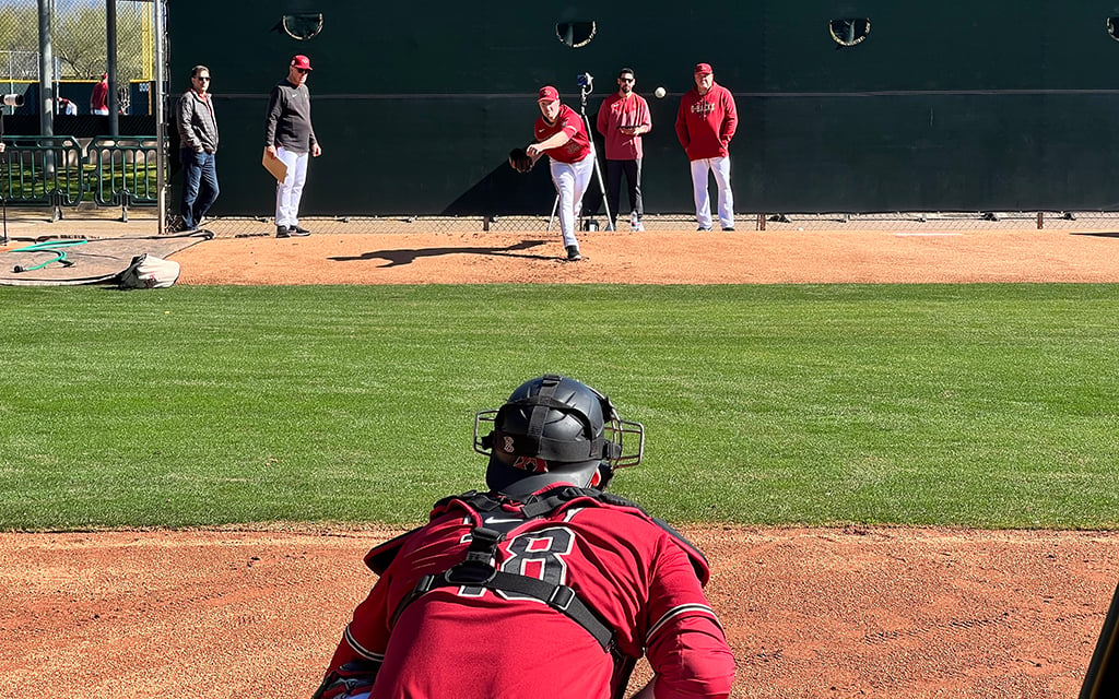 Arizona Diamondbacks left-handed reliever Joe Mantiply fires a pitch to catcher Carson Kelly on the first day of pitchers and catchers reporting to spring training at Salt River Fields at Talking Stick in Scottsdale. (Photo by Brevin Monroe/Cronkite News)