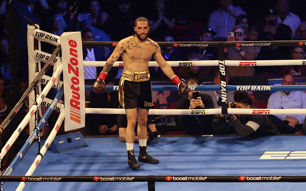 “I like when there’s time, when I get to go a few rounds. It’s fun.” Nico Ali Walsh secured a unanimous decision victory after going the distance against Eduardo Ayala. (Photo by Damian Rios/Cronkite News)