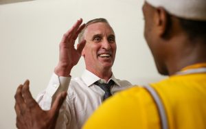 ASU coach Bobby Hurley and DJ Horne greet each other in the locker room after ASU defeated Arizona in Tucson, (Photo by Damian Rios/ Cronkite News)