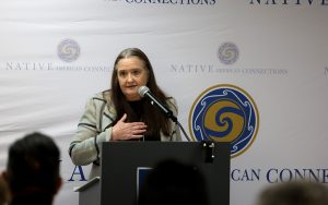 Diana Yazzie Devine, CEO of Native American Connections, speaks at the opening of HomeBase Surprise on Feb. 2, 2023. (Photo by Logan Camden/Cronkite News)