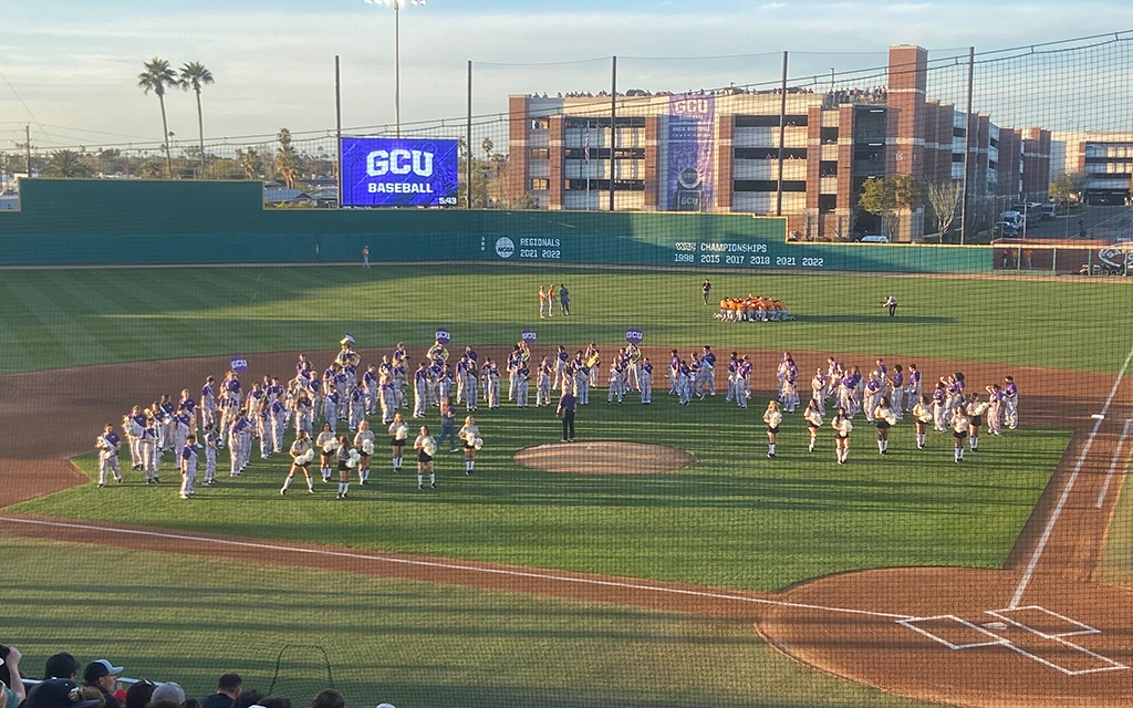 The Grand Canyon University band and cheerleaders take the field before GCU baseball's home opener against Tennessee last Saturday. (Photo by Nicholas Hodell/Cronkite News)