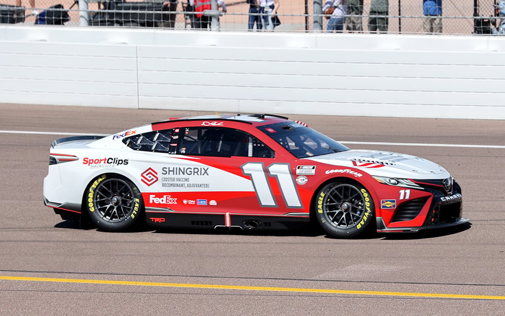 Denny Hamlin, the driver of the No. 11 car for Joe Gibbs Racing, finished 23rd on Sunday after intentionally wrecking into Ross Chastain's racecar. (Photo by Grace Edwards/Cronkite News)