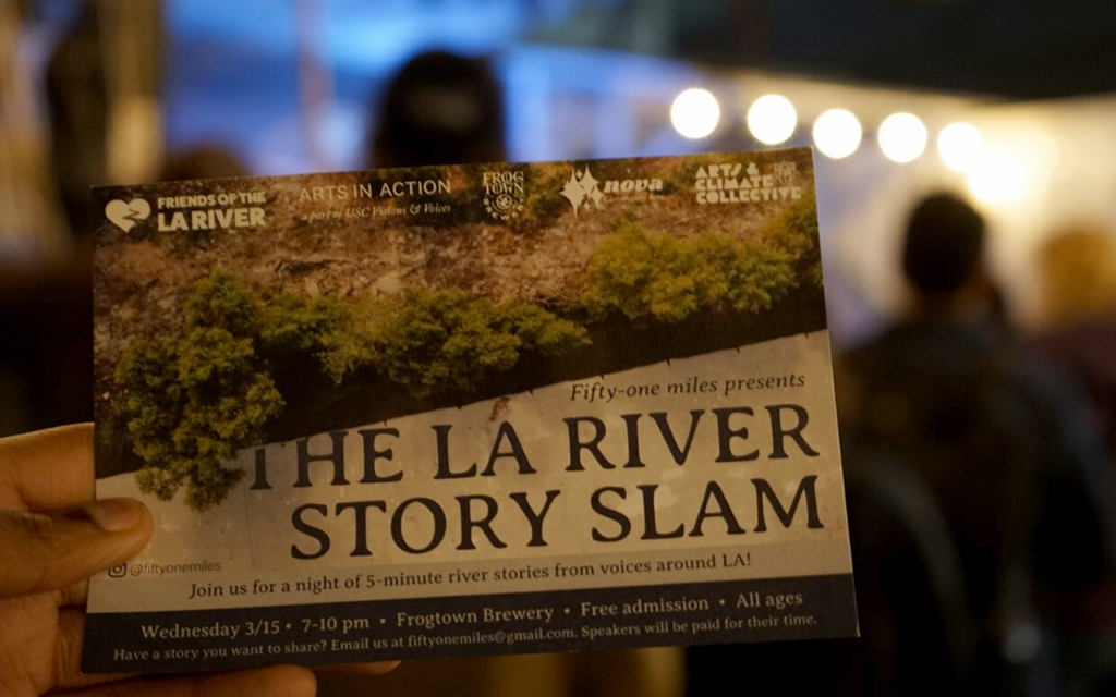 The LA River story slam was held at the Frogtown Brewery. Guests were encouraged to shop, eat and drink. In the back were a frog-themed taco food truck and an “artist's alley.” It included art from Margaret Gallagher, Kris Mukai, Nova Community Arts and Emily Wallerstein. (Photo by Ayana Hamilton/Cronkite News)