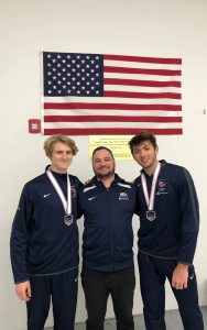 Phoenix Fencing Academy founder, owner and coach Will Becker, middle, has prepared countless students like Jackson McBride, left, and Luke Linder to compete on the national and international stages. (Photo courtesy of Phoenix Fencing Academy)