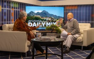 Pat McMahon, right, interviews journalist and author Jana Bommersbach on the “Arizona Daily Mix” morning show. Photo taken at AZTV7 in Phoenix on March 22, 2023. (Photo by Emily Mai/Cronkite News)