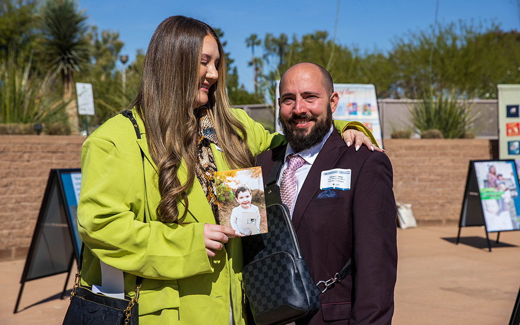 Kelsey and Zaccarri Krasnov tell how an organ donation saved their son, Valen’s, life when he was 3 years old. Photo taken during Donate Life Living Donor Day in Phoenix on April 5, 2023. (Photo by Drake Presto/ Cronkite News)