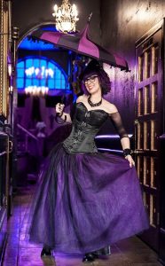 Fashion designer Hilary Branner Fuerst shows off an outfit with some of her most popular items. She says her Goth-inspired skirts and umbrellas are hot sellers. (Photo courtesy of Hilary Branner Fuerst/Hilary’s Vanity)